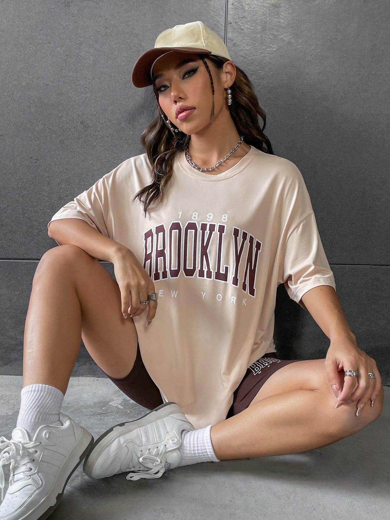 SHEIN MOOSTA Letter Graphic Drop Shoulder Tee